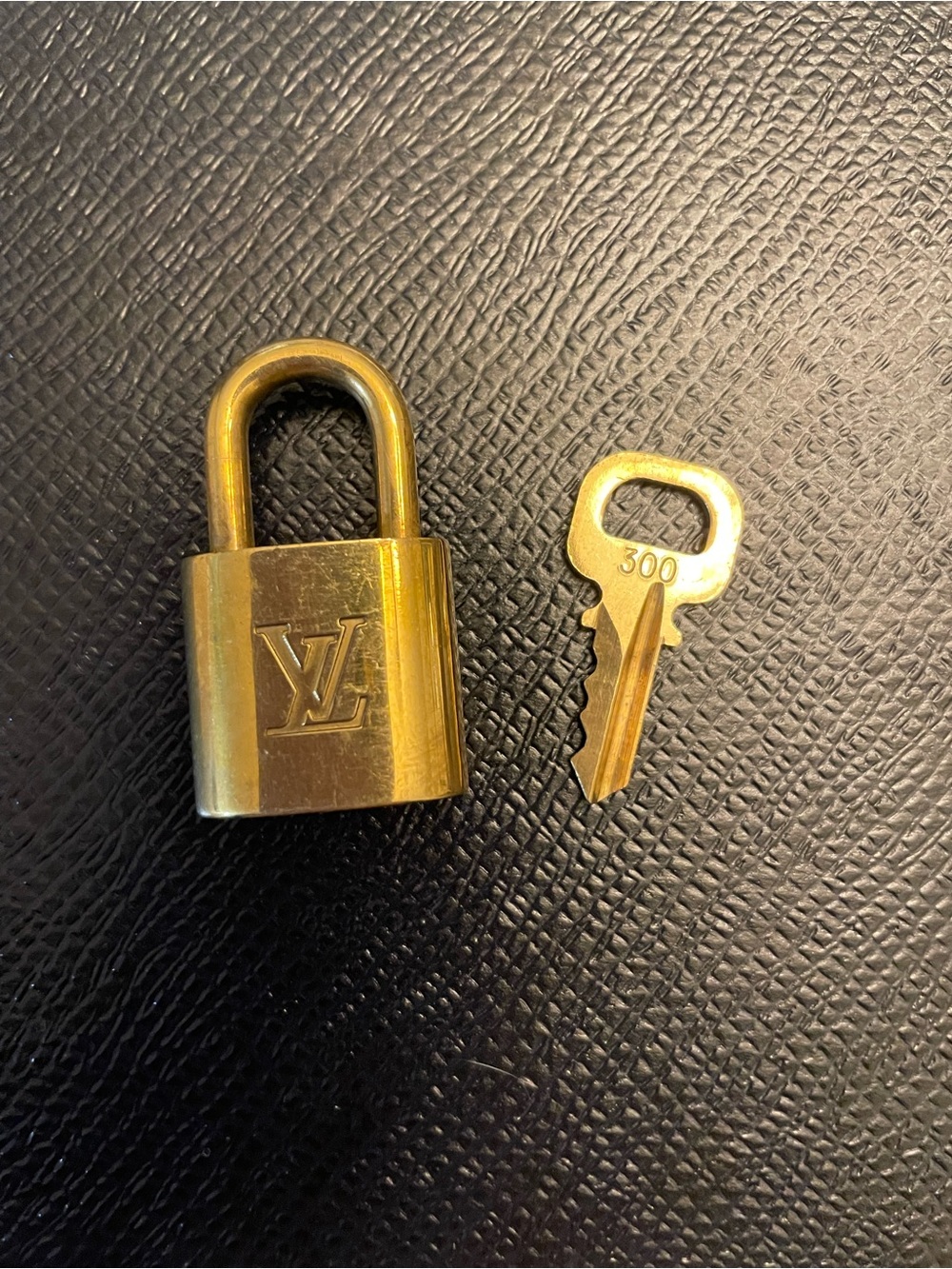 Louis Vuitton Brass-Tone Padlock and Key. #300